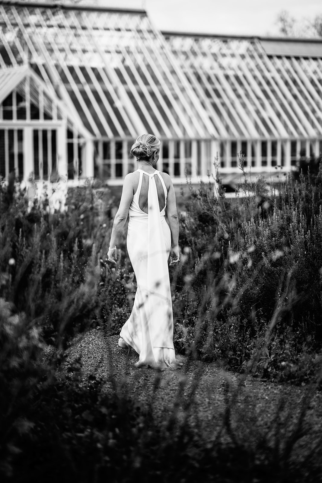 bride in walled garden at Heckfield Place