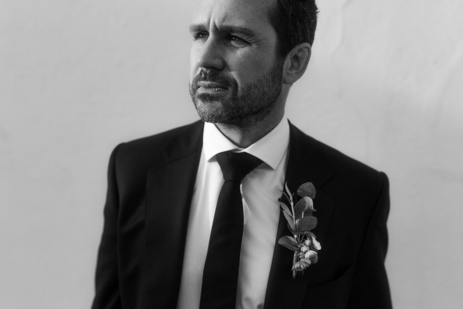 groom portrait in black and white
