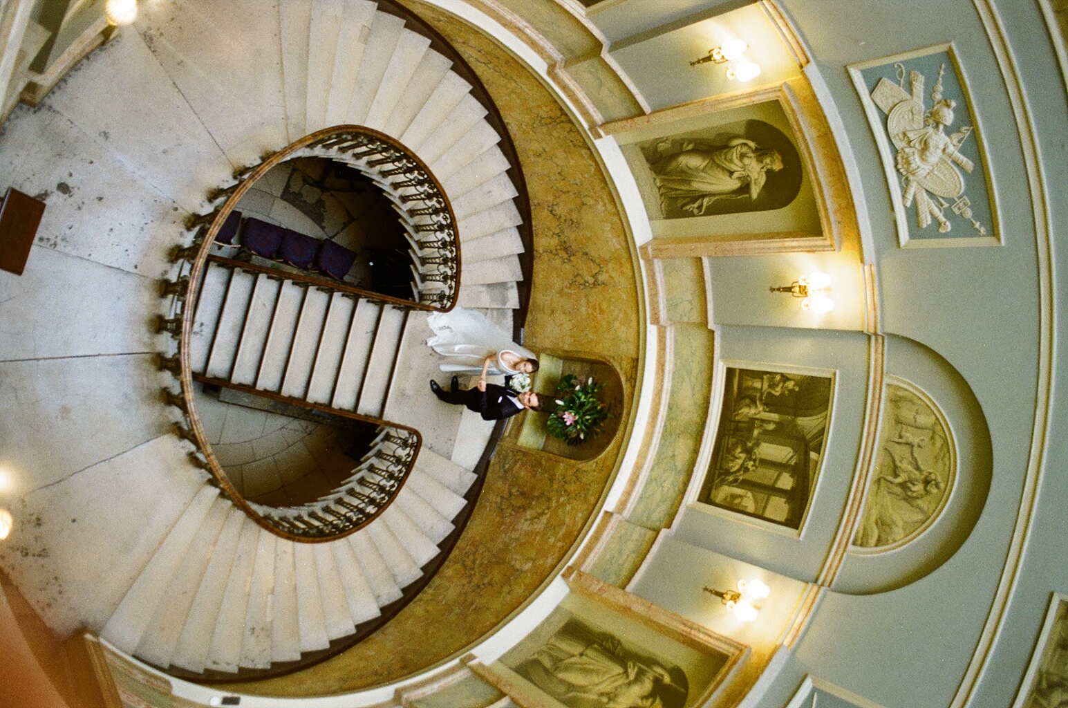 classic staircase photograph of newlyweds at HomeHouse in London