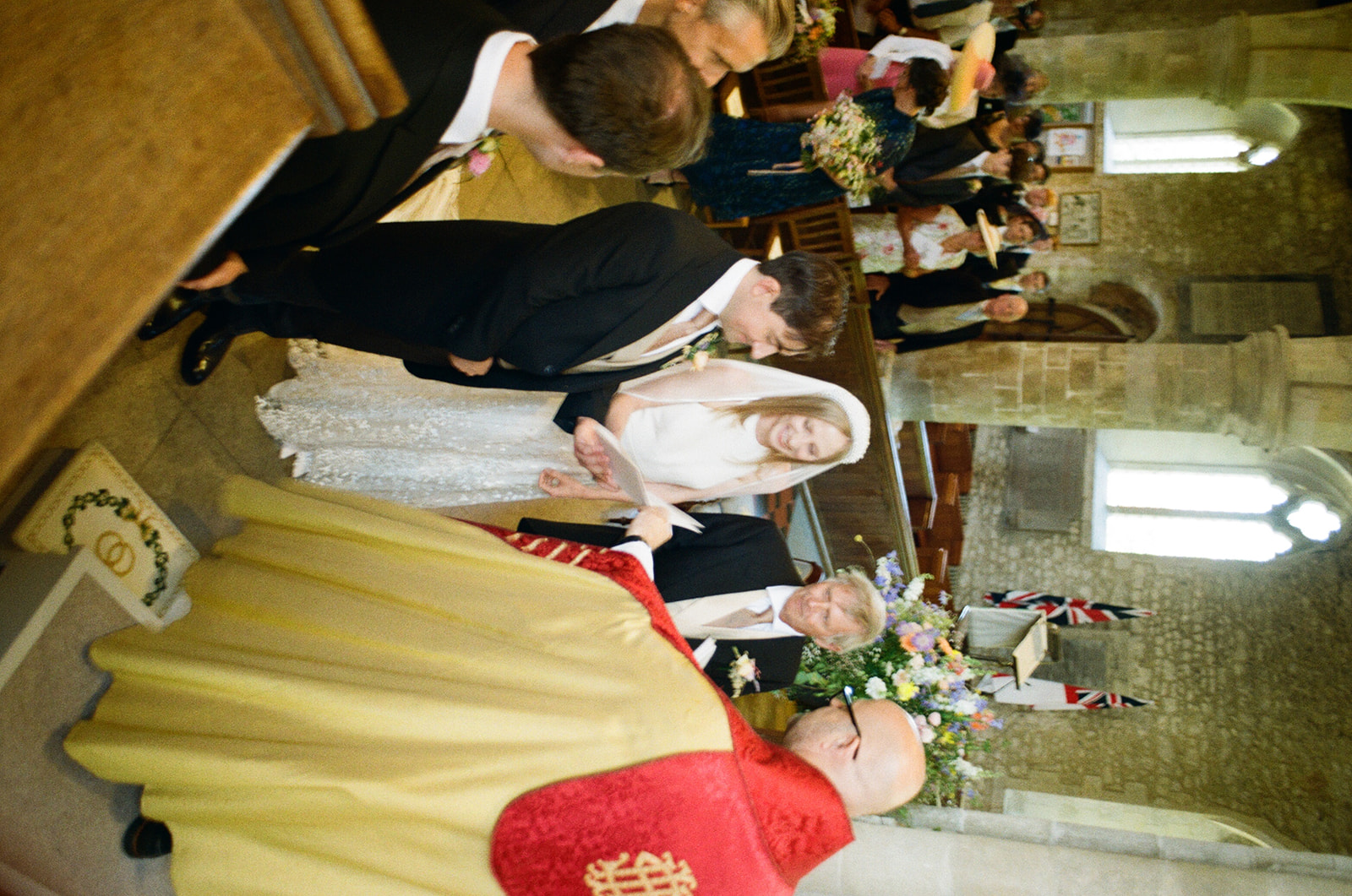 Vows being said at traditional church wedding