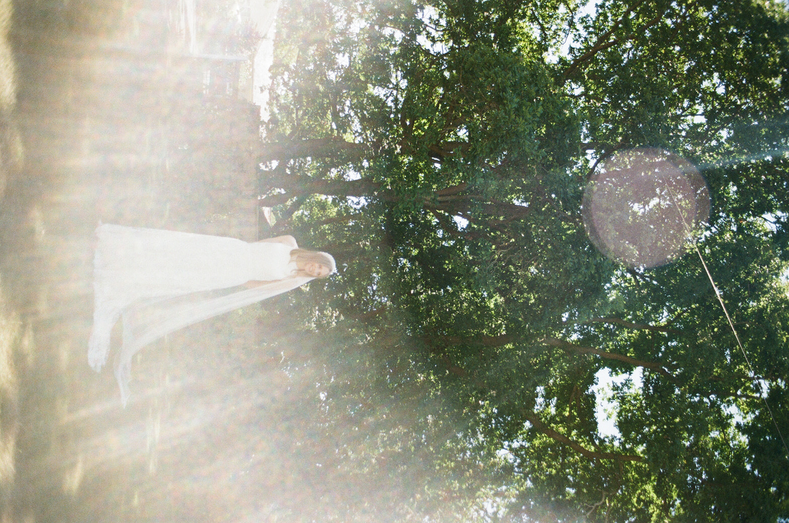 sunflare caught in bridal portrait