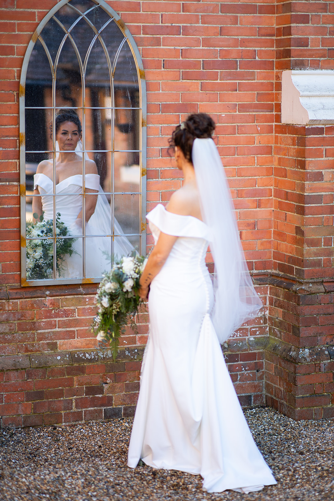 bridal portrait outside the getting ready room at highley manor sussex