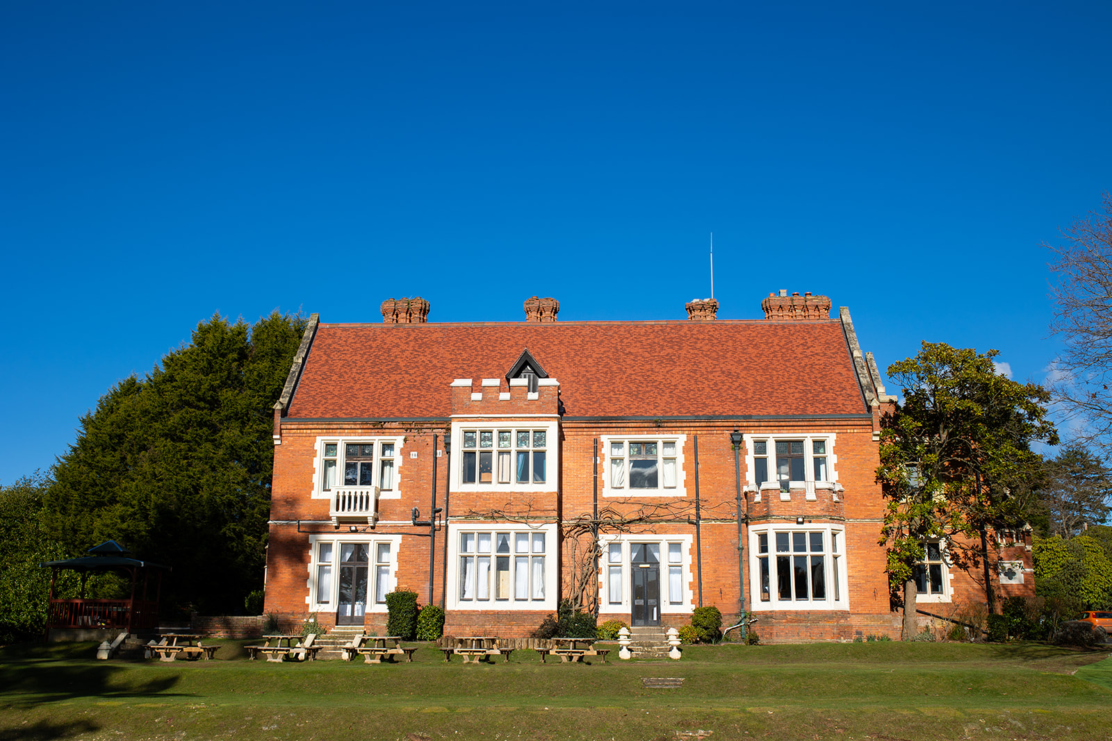highly manor on a glorious blue sky winter wedding day