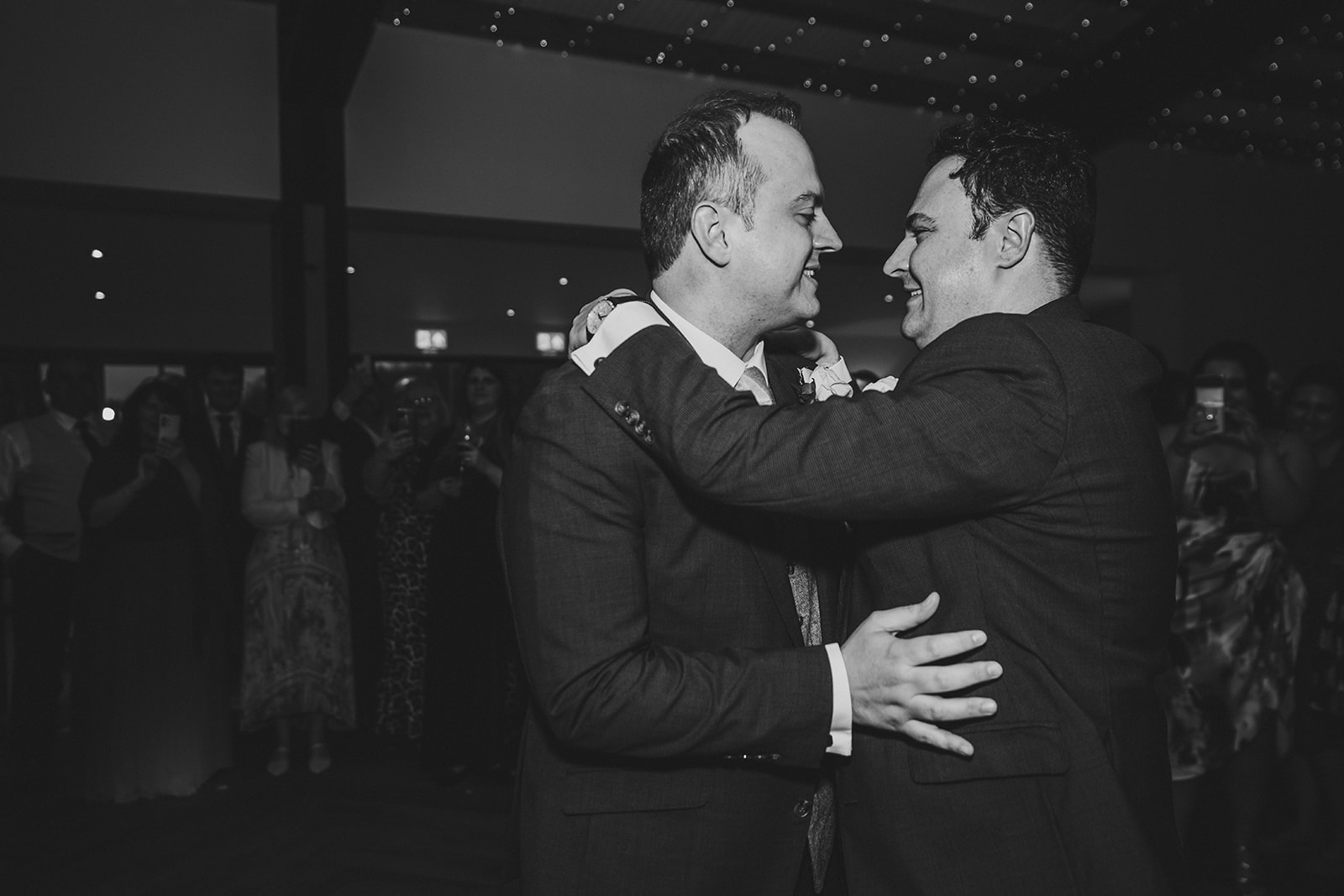 two guys married in black and white