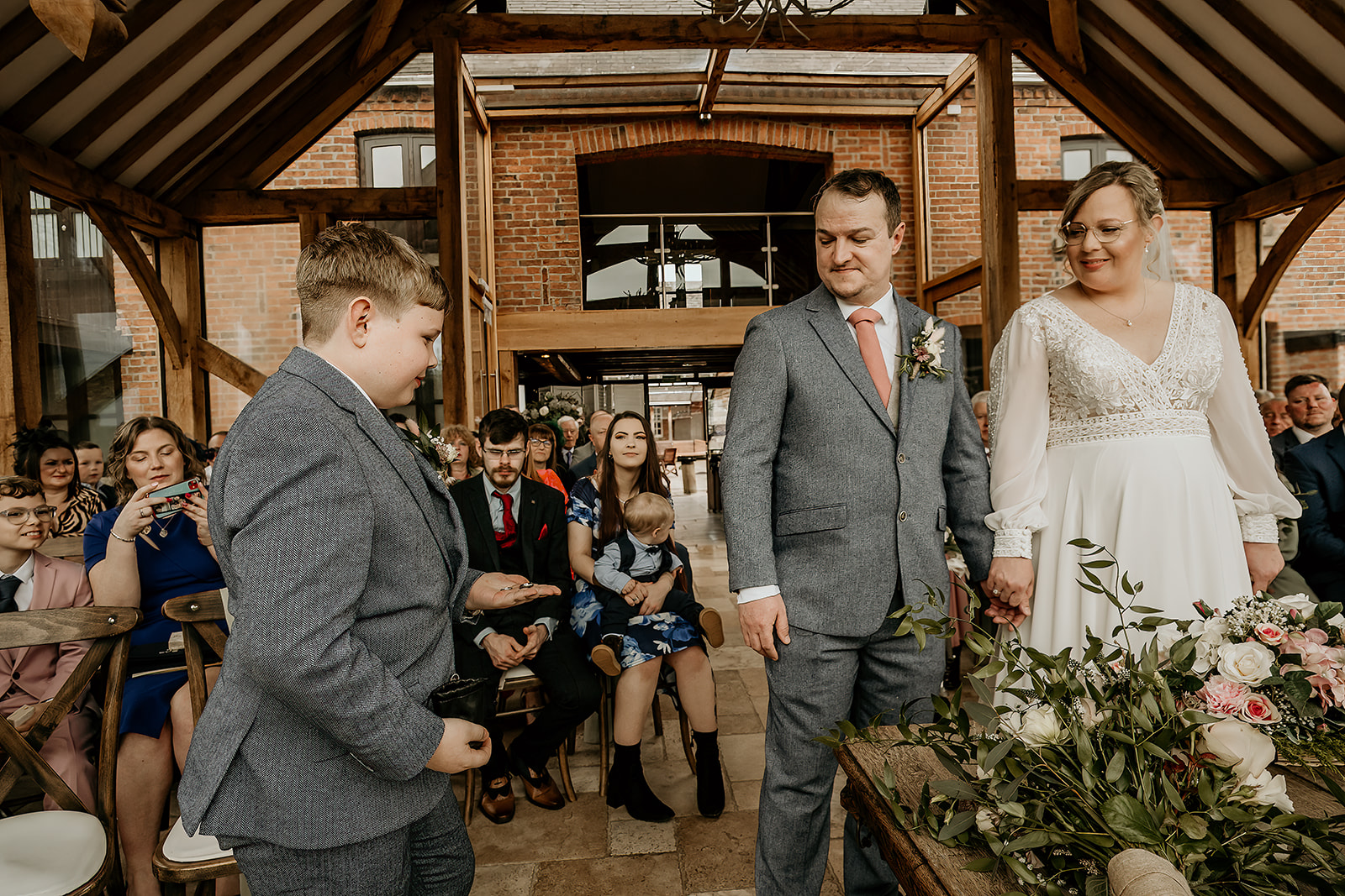 exchanging of rings at swancar farm wedding venue in nottingham
