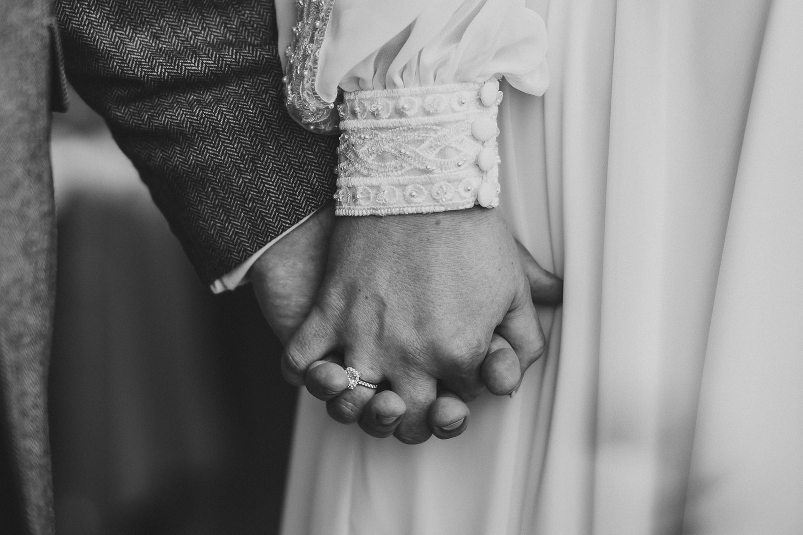 holding hands on wedding day